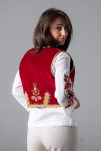 young woman wearing handmade Serbian embroidered top