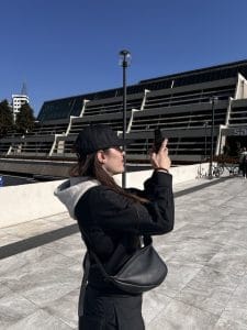 Traveler taking a photo at private tour of New Belgrade architecture