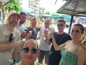 Group of friends having a toast at farmers market in Belgrade