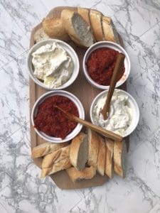 Servings of traditional Serbian spreads Ajvar and Kajmak